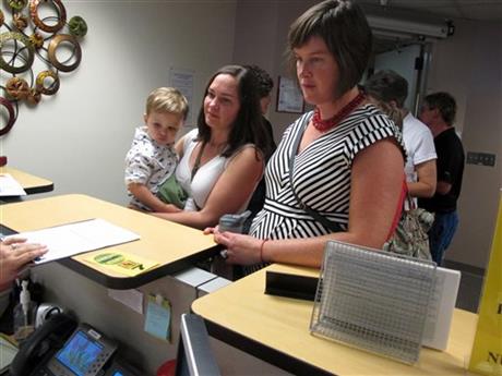 2 MORE NM COUNTIES GIVE SAME-SEX LICENSES