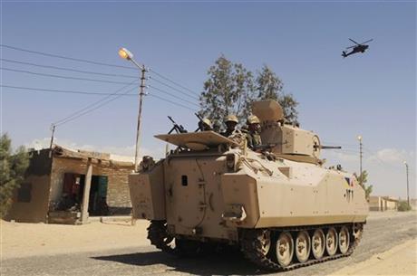 SUICIDE BOMBS HIT EGYPT MILITARY IN SINAI, KILL 9