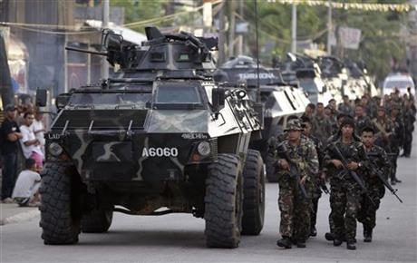 FILIPINO REBELS HOLD HOSTAGES AS HUMAN SHIELDS