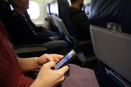 FAA eases rules on electronic devices on planes