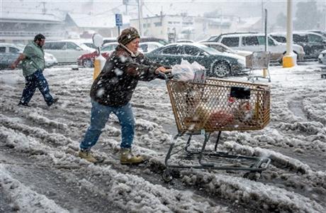 GREAT PLAINS STORM BRINGS BOTH SNOW, TORNADOES