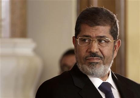 EGYPT’S MORSI DEFIANT IN OPENING SESSION OF TRIAL