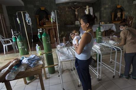 AP PHOTOS: Chapel acts as hospital for newborns