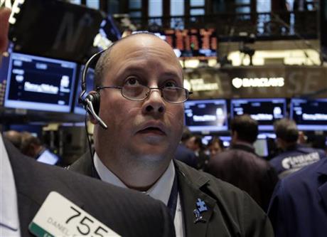 Wall Street ends a choppy day modestly higher