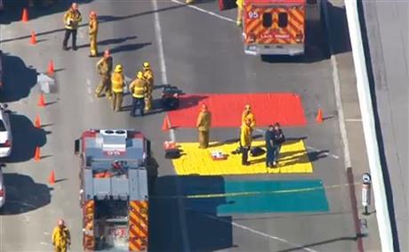 Suspect in LAX shooting in custody