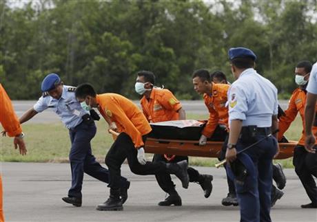 Bad weather hobbles Indonesia jet recovery; 7 bodies found