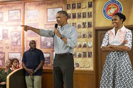President Barack Obama warns GOP he plans to use veto pen in 2015