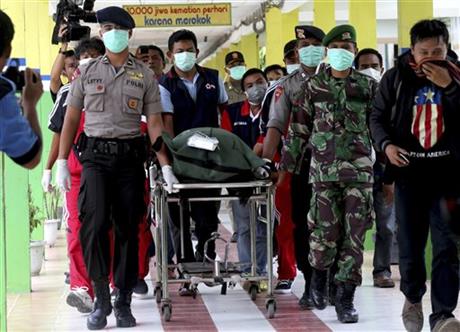 Indonesia official: Some AirAsia victims belted in seats