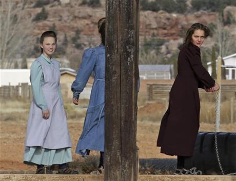 Town once run by polygamist leader is sharply divided