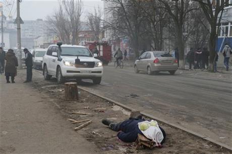 Rockets kill 21 in Ukraine city as rebel offensive begins