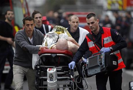 12 dead in terror attack on Paris paper; manhunt for gunmen