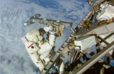 Spacewalking astronauts finish extensive, tricky cable job