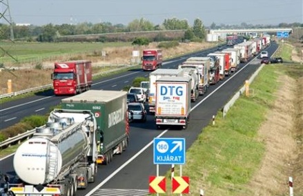 Austria inspects trucks for migrants, creates 18-mile backup