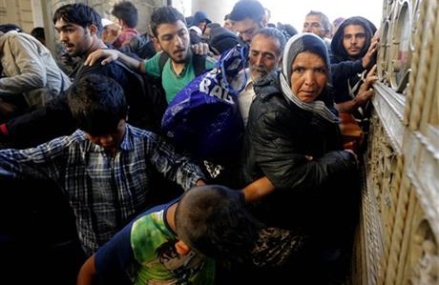 The Latest: Hungarian PM says migrant crisis is German issue