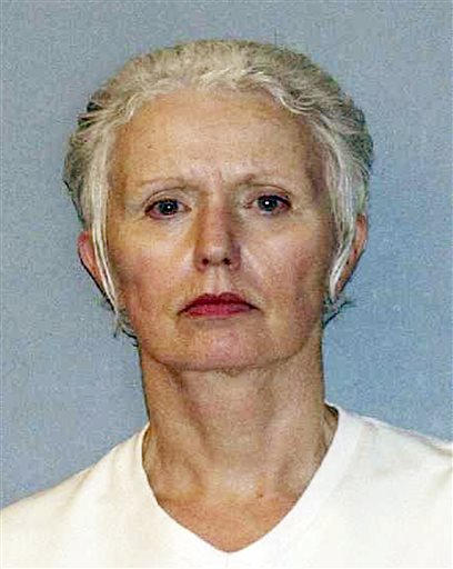 FILE - This undated file photo provided by the U.S. Marshals Service shows Catherine Greig, longtime girlfriend of Whitey Bulger, who was captured with Bulger in 2011 in Santa Monica, Calif. Greig pleaded guilty in federal court in Boston in 2012 and is serving an eight-year sentence for identity fraud and conspiracy to harbor a fugitive. Greig was indicted Tuesday, Sept. 22, 2015, on one count of criminal contempt that alleges she refused to testify since December 2014 whether other people helped Bulger during his 16 years on the run. (AP Photo/U.S. Marshals Service, File)