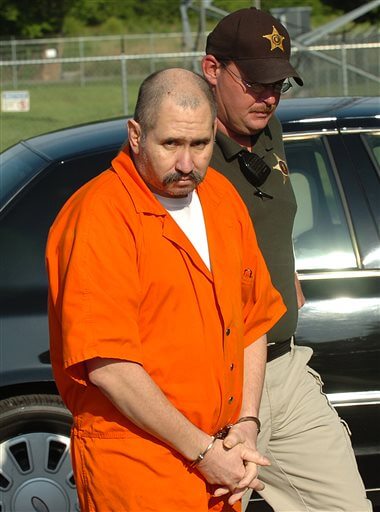 FILE - In an undated file photo, Jose Manuel Martinez arrives at the Lawrence County Judicial Building in Moulton, Ala., before pleading guilty to shooting Jose Ruiz in Lawrence County, Ala., in March 2013. Martinez who admitted to killing dozens of people across the United States as an enforcer for drug cartels in Mexico, will begin to hear evidence in court Tuesday, Oct. 6, that prosecutors say proves he gunned down nine people throughout Central California. Authorities say Martinez opened up to them after his arrest in 2013, detailing a long, violent career with over 30 victims. (John Godbey/The Decatur Daily via AP)