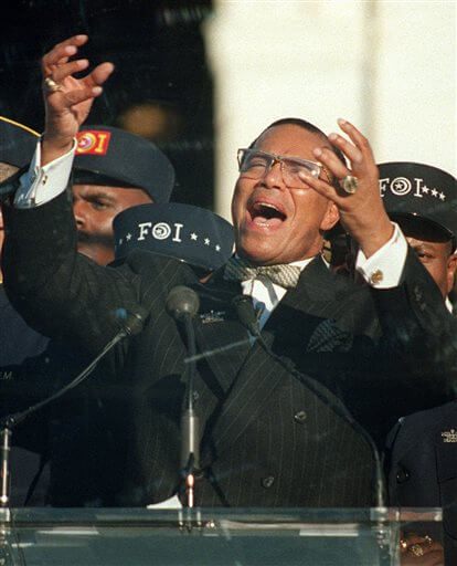 FILE - In this Monday, Oct. 16, 1995 file photo, Nation of Islam leader Louis Farrakhan addresses the Million Man March from Capitol Hill in Washington. (AP Photo/Doug Mills)