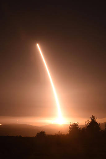 This Thursday, Feb. 25, 2016 photo provided by the U.S. Air Force shows an unarmed Minuteman 3 intercontinental ballistic missile launches during an operational test from Vandenberg Air Force Base, Calif. The unarmed missile roared out of its underground bunker on the California coastline and soared over the Pacific, inscribing the signature of American power amid growing worry about North Korea's pursuit of nuclear weapons capable of reaching U.S. soil.(Staff Sgt. Jim Araos/U.S. Air Force via AP)