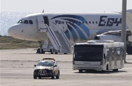 Egypt plane drama ends: hijacker arrested, passengers freed