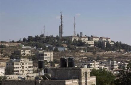 The Latest: Palestinians condemn Israeli settlement plans